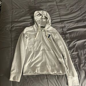 A gray/white true religion jacket with a navy blue accent. Size small.